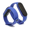 Two blue fitness tracker bands are shown against a white background. Voir les images du produit