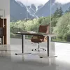 An office desk with a chair in front of a large window overlooking a mountain landscape. Produktbild-Vorschau