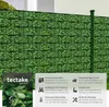 A close-up view of a green fence with a leaf pattern, accompanied by informational text and a logo. Produktbild-Vorschau