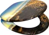 A toilet seat with a beach and sunset image printed on it. Náhľad obrázku produktu