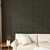 A living room scene with a couch and a wall decorated with acoustic panels. Anteprima dell’immagine prodotto