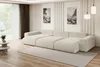 A modern living room with a large sectional sofa, rug, and decorative wall art. Produktbild-Vorschau