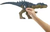 A hand is shown inserting a card into a compartment on a toy dinosaur. Podgląd zdjęcia produktu