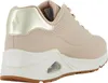 A side view of a beige Skechers sneaker with gold accents. Produktbild-Vorschau
