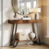 A console table with decorative items in a room. Podgląd zdjęcia produktu