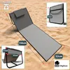 A beach mat or chair laid out on the sand, with dimensions and weight indicated. Produktbild-Vorschau