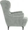 A side view of a light gray velvet armchair. Náhľad obrázku produktu