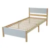 A single bed frame with a wooden frame and white headboard and footboard. Produktbild-Vorschau