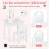 A white children's vanity table and chair set with an illuminated oval mirror, shown with close-ups of the mirror's light settings. Náhled obrázku produktu