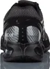 The back view of a black Nike Air Max Torch 4 sneaker. Voir les images du produit