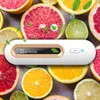 A white air purifier is placed in the center of the image, surrounded by various citrus fruit slices. Náhľad obrázku produktu