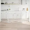 A white wooden pet gate is set up in a kitchen environment. Podgląd zdjęcia produktu