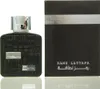 A bottle of Lattafa Ramz Silver Eau de Parfum for men and its packaging are displayed side-by-side on a white background. Náhled obrázku produktu