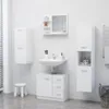 A clean, modern bathroom with white tiled walls and floor, featuring white bathroom furniture including a sink, vanity, and storage cabinets. Náhled obrázku produktu
