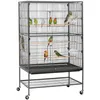 A multi-level bird cage with several birds inside, displayed on a white background. Produktbild-Vorschau