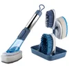 A set of cleaning brushes and a sponge with a liquid dispenser, displayed on a white background. Anteprima dell’immagine prodotto