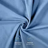 A close-up shot of crumpled light blue fabric, likely a textile product, with two informational icons and text overlays. Produktbild-Vorschau