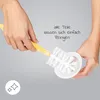 Hands holding a breast pump part and a cleaning brush, with text overlay. Podgląd zdjęcia produktu