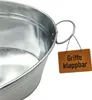 Close-up of a galvanized metal tub with a leather tag attached to the handle. Voir les images du produit