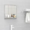 A bathroom scene with a mirror, shelf, faucet, and towels. Produktbild-Vorschau