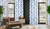 A living room scene with a chair, curtains, and a window. Anteprima dell’immagine prodotto