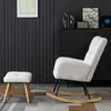 A white rocking chair and ottoman are placed on a patterned rug in a room with dark walls and a black cabinet. Podgląd zdjęcia produktu