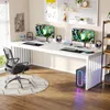A modern home office setup with a large white desk, two computer monitors, gaming accessories, and a computer tower with RGB lighting. Anteprima dell’immagine prodotto