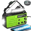A green and black emergency radio with a flashlight and a compass attached. Produktbild-Vorschau