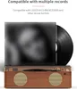 A retro-style music player with a vinyl record and CD cover displayed. Produktbild-Vorschau