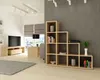 A modern living room with a stereo shelving unit against a textured gray wall. Produktbild-Vorschau