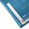 A close-up, angled view of a blue paper cutter with silver and red accents. Voir les images du produit