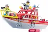 A toy fire rescue boat with two figures. Produktbild-Vorschau