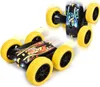 Two remote-controlled stunt cars with yellow wheels on a white background. Produktbild-Vorschau