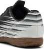 Close-up view of the heel and sole of a black and white athletic shoe. Produktbild-Vorschau