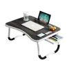 A lap desk with a laptop, tablet, and coffee cup on it. Anteprima dell’immagine prodotto