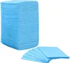 A stack of blue disposable pads and a few pads fanned out. Produktbild-Vorschau