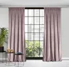 A pair of pink curtains hangs in front of a large window with a city view. Podgląd zdjęcia produktu
