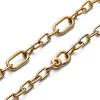 A close-up shot of a gold chain bracelet against a white background. Voir les images du produit