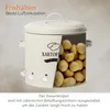 A cream-colored potato storage tin filled with potatoes, with a cutaway view showing the interior. Text overlays describe its features. Produktbild-Vorschau