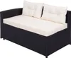 A black poly-rattan sofa with cream cushions, shown from a side-front angle on a white background. Anteprima dell’immagine prodotto