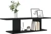 A black TV stand with decorative items on it. Náhľad obrázku produktu