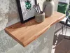 A wooden shelf with a live edge is mounted on a textured wall. Decorative items like a framed picture of a beetle, a pen holder with scissors and pencils, and a vase are placed on the shelf. Produktbild-Vorschau
