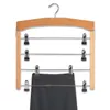 A multi-tier hanger for pants, made of wood and metal, with a pair of pants clipped to the bottom tier. Náhled obrázku produktu