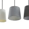 Three pendant lamps with fabric shades in different colors are shown against a white background. Produktbild-Vorschau