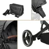 A collage of close-up images showing different parts of a baby stroller, including a bag attachment, the canopy, the handle, and a wheel. Produktbild-Vorschau