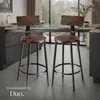 Two bar stools in a modern kitchen setting. Náhled obrázku produktu