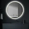 A modern bathroom vanity with a round, illuminated mirror above it. Anteprima dell’immagine prodotto