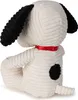 A stuffed toy dog, Snoopy, is shown from a side-back view, sitting down. Anteprima dell’immagine prodotto