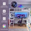 A loft bed with a desk and gaming setup underneath, featuring LED lighting. Produktbild-Vorschau