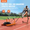 A woman running on a track while pulling a weight sled. Anteprima dell’immagine prodotto